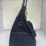 Side view of modern structured handbag