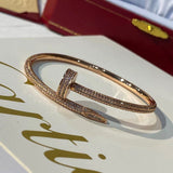 Side view of Cartier unisex jewelry piece