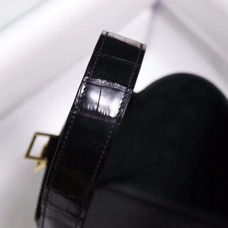Side view of understated structured handbag