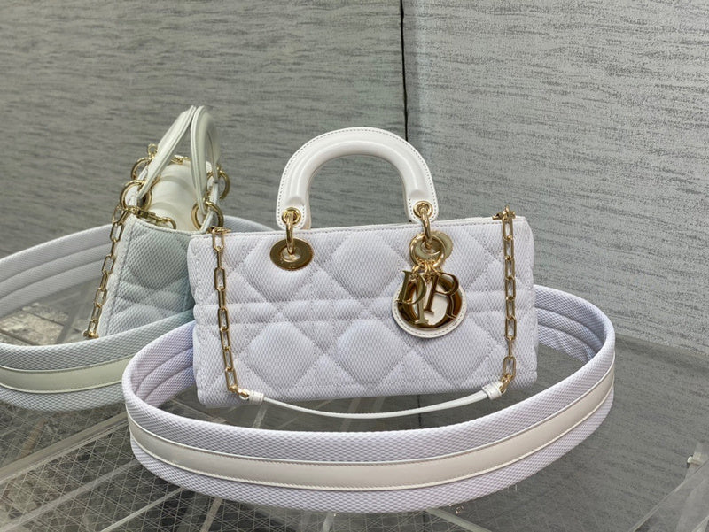 Side profile of premium chic women's handbag – women's statement bag