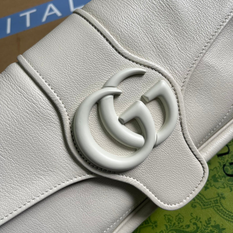 Handle and strap detail of statement sleek women's handbag – women's statement bag