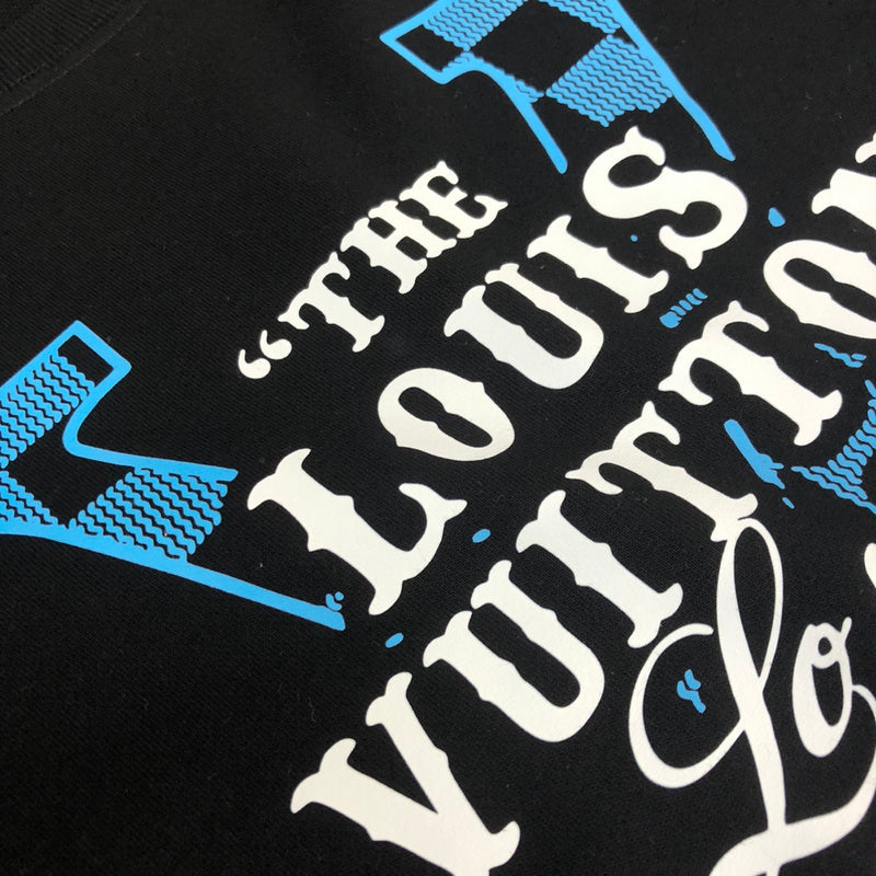 Flat lay presentation of Louis Vuitton luxury clothing with tailored silhouette