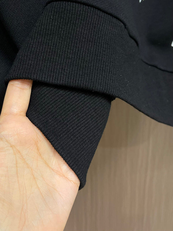 Close-up detail shot of Louis Vuitton luxury clothing with tailored silhouette