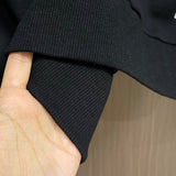 Close-up detail shot of Louis Vuitton luxury clothing with tailored silhouette