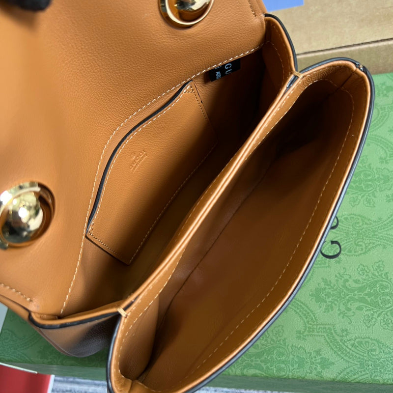 Side profile of modern polished women's handbag – women's luxury handbag