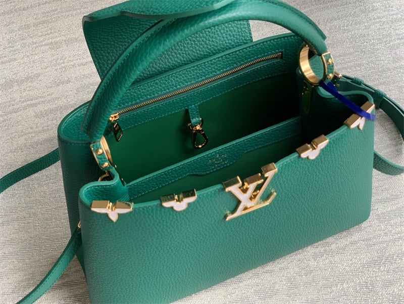  Sleek structured bag carried on shoulder 40