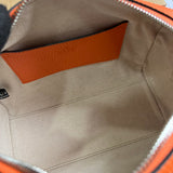 Styled lifestyle shot of sleek refined women's handbag – women's premium purse