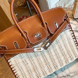  polished crossbody bag detail view showing craftsmanship