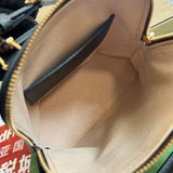 Side view of modern structured handbag