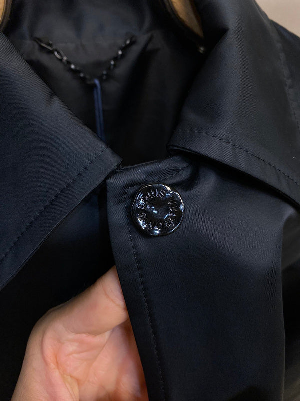 Flat lay presentation of Louis Vuitton luxury clothing with everyday silhouette
