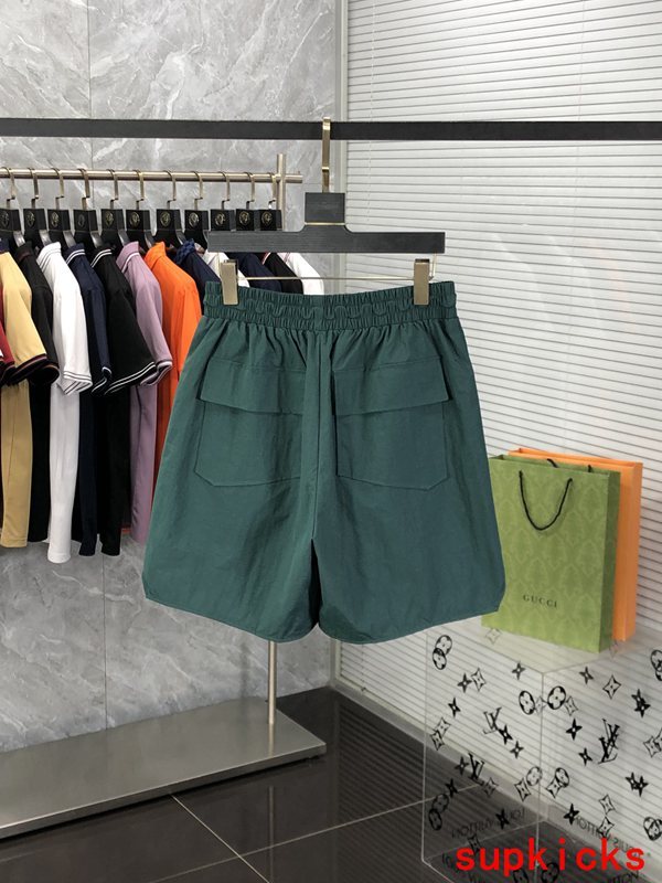Side profile of Rhude luxury clothing with logo-detail design