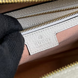 Close-up detail of statement polished women's handbag – women's luxury accessory