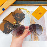Angled view of Louis Vuitton unisex sunglasses