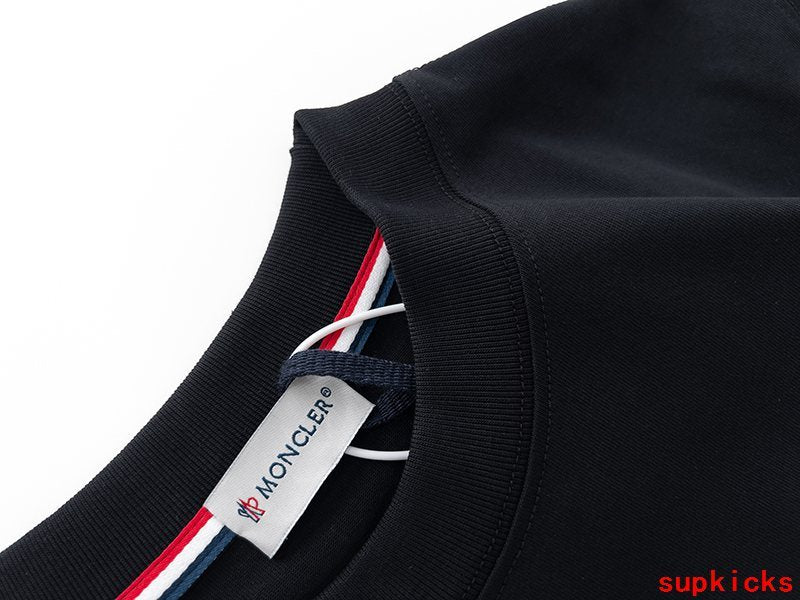 Full styled look of Moncler luxury clothing with monogram-inspired silhouette