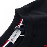 Full styled look of Moncler luxury clothing with monogram-inspired silhouette