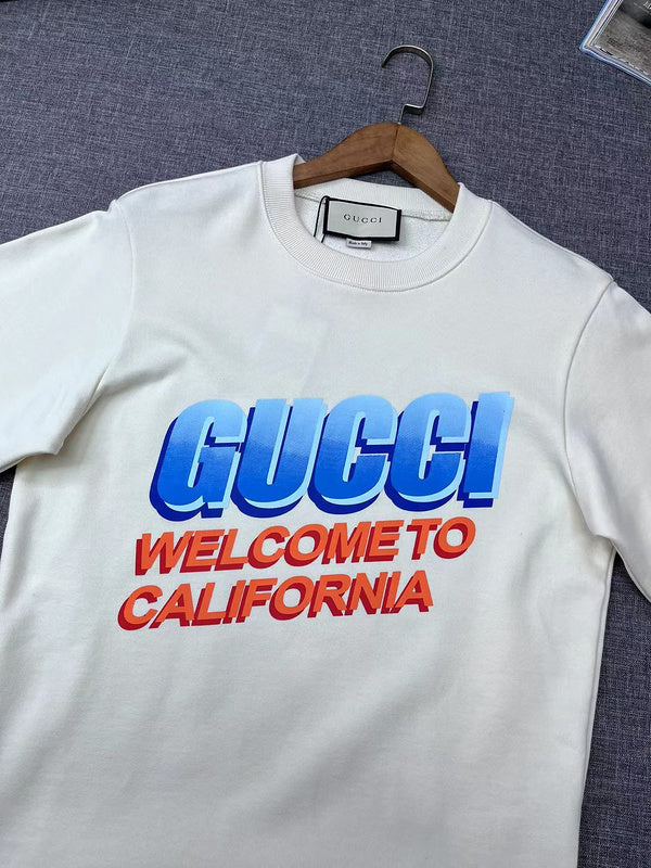 Front view of Gucci luxury clothing with signature branding