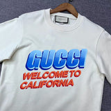 Front view of Gucci luxury clothing with signature branding