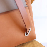  crossbody bag close-up of hardware and finish 11