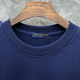 Front view of Louis Vuitton luxury clothing with tailored silhouette