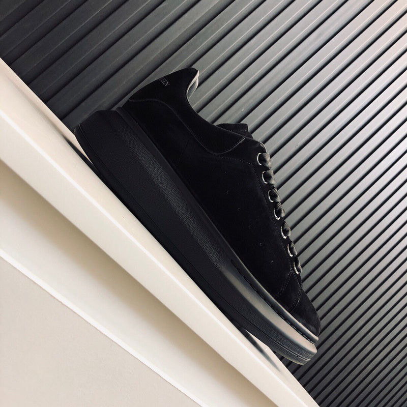 Alexander McQueen tonal black luxury sneakers view 5 classic court silhouette