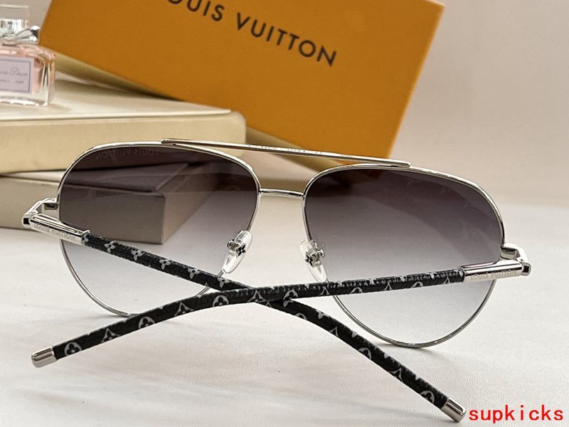 Close-up detail view of Louis Vuitton unisex sunglasses
