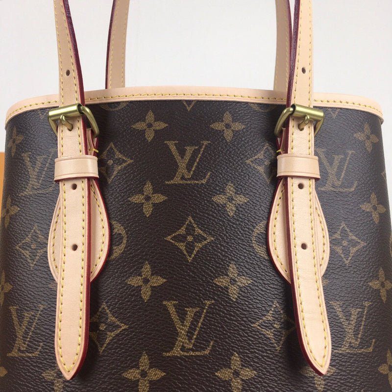 Styled lifestyle shot of refined signature women's handbag – women's premium purse