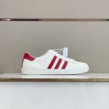Gucci two-tone luxury sneakers view 9 signature lace-up style