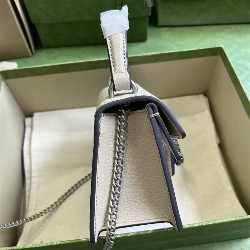 Handle and strap detail of chic modern women's handbag – women's statement bag