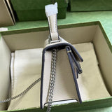 Handle and strap detail of chic modern women's handbag – women's statement bag