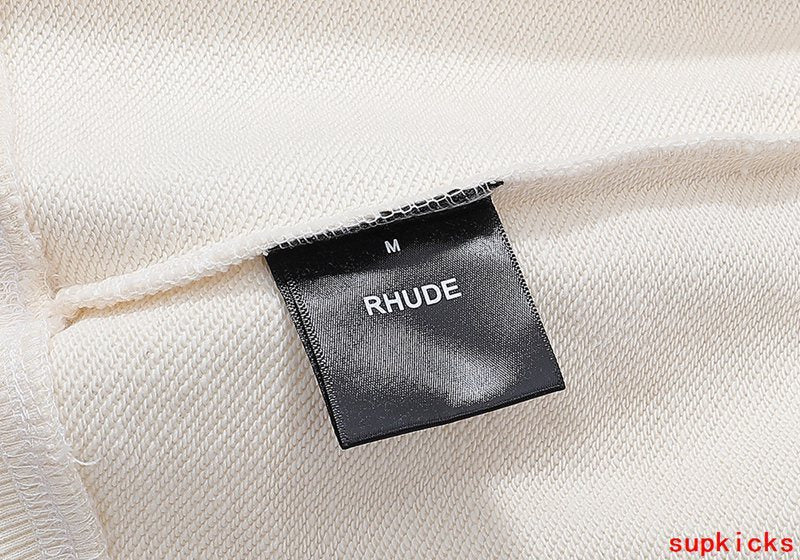 Close-up detail shot of Rhude luxury clothing with runway-inspired design