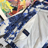 Close-up detail shot of Louis Vuitton luxury clothing with everyday silhouette