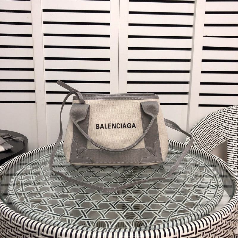 Front view of signature polished women's handbag – women's luxury handbag
