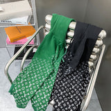 Close-up detail shot of Louis Vuitton luxury clothing with monogram-inspired silhouette