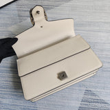 Close-up detail of elevated modern women's handbag – women's designer-style accessory