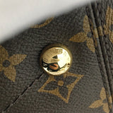 Side profile of modern statement women's handbag – women's luxury accessory