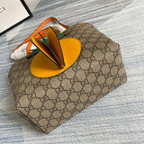 Handle and strap detail of elevated modern women's handbag – women's everyday handbag