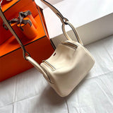  contemporary shoulder bag styled with outfit
