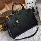 Side profile of refined signature women's handbag – women's designer-style accessory