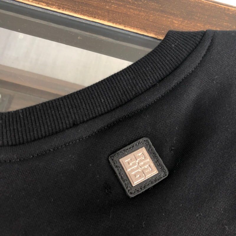 Close-up detail shot of Givenchy luxury clothing with contemporary cut