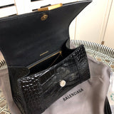 Front view of classic sleek women's handbag – women's luxury accessory