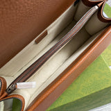 Side profile of modern premium women's handbag – women's luxury accessory