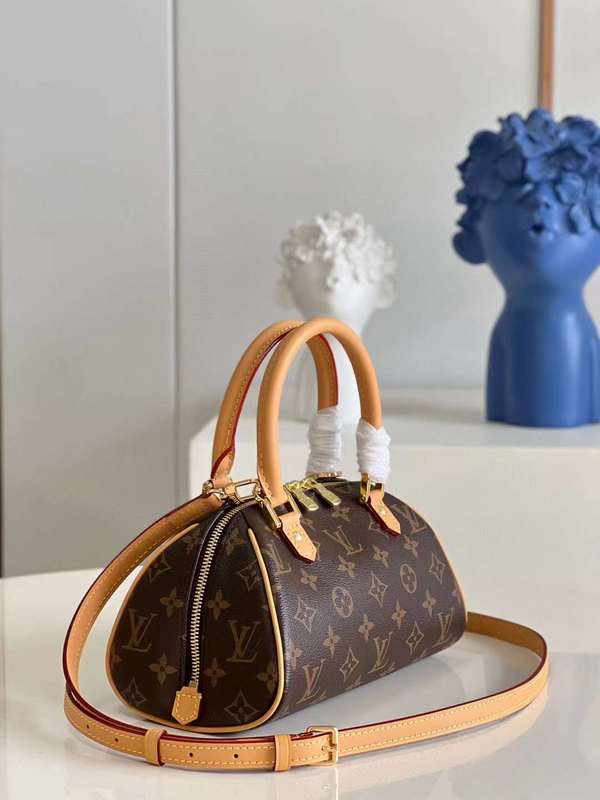 Styled lifestyle shot of refined everyday-luxe women's handbag – women's luxury handbag
