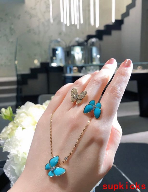 Lifestyle view of Van Cleef & Arpels unisex jewelry piece