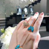 Lifestyle view of Van Cleef & Arpels unisex jewelry piece