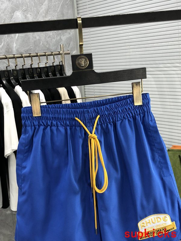 Close-up detail shot of Rhude luxury clothing with streetwear-inspired cut