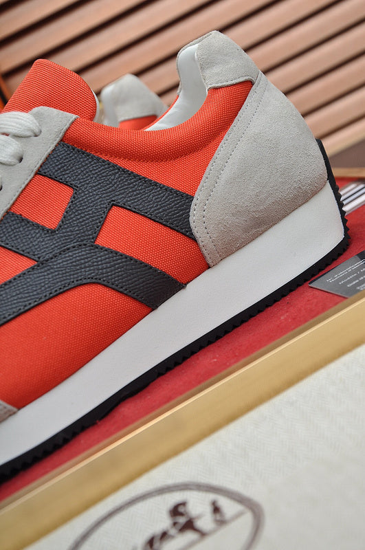 Hermes shoes Style 202 - close-up of classic monogram styling