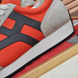 Hermes shoes Style 202 - close-up of classic monogram styling