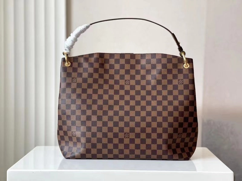 Styled lifestyle shot of sleek everyday-luxe women's handbag – women's designer-style accessory