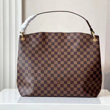 Styled lifestyle shot of sleek everyday-luxe women's handbag – women's designer-style accessory