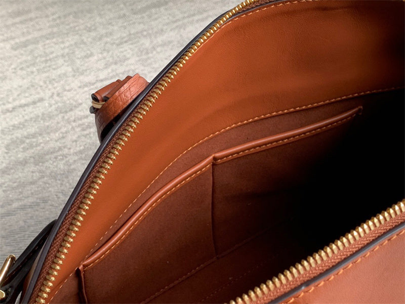  graceful top-handle bag styled with outfit 24
